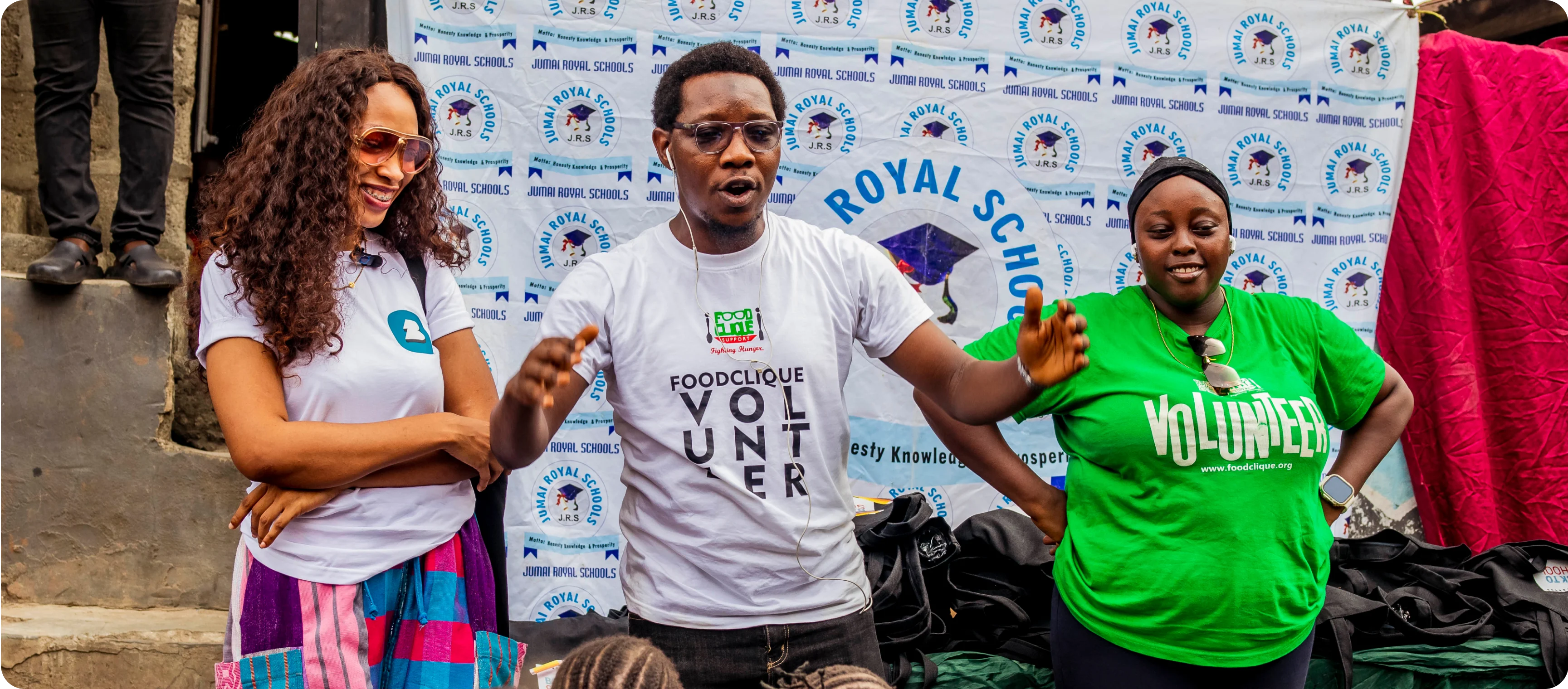a man giving a speech to children
